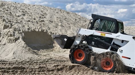 starting your own skid steer business|make money with skid steer.